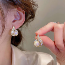 Elegant Swirl Pearl Stud Earrings