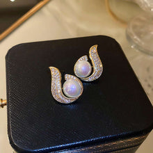 Elegant Swirl Pearl Stud Earrings