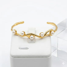 The Sculptural Wave Pearl Cuff